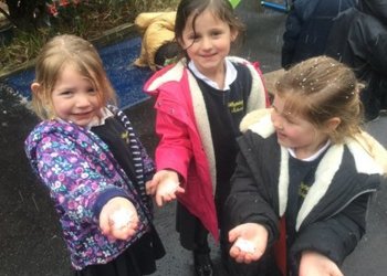 Reception enjoyed the sudden hailstone downpour this afternoon; catching them on their tongue and making 'snow' balls.