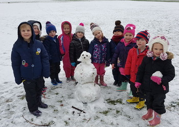 Forest school enjoying the snow